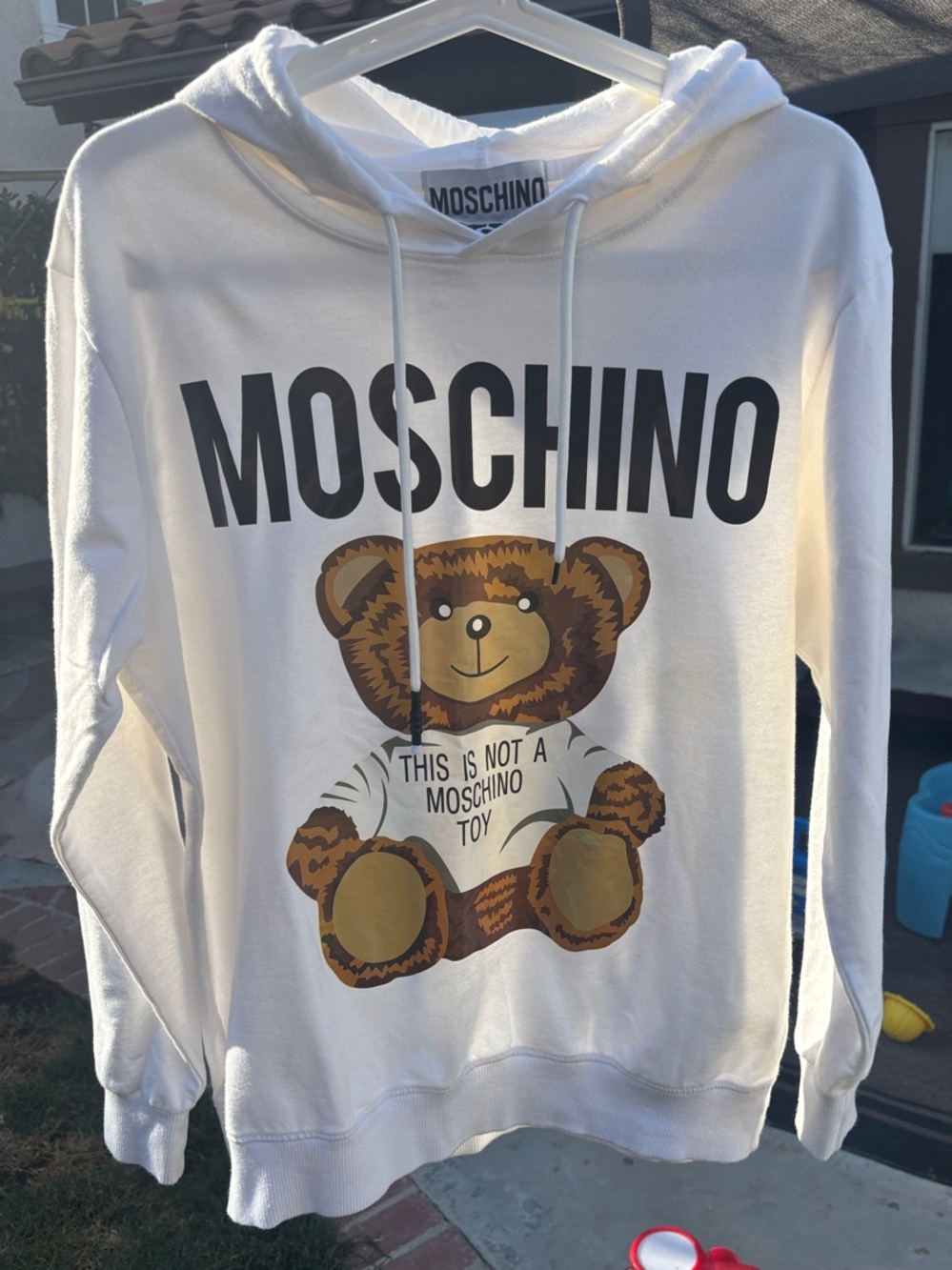 Moschino White Hoodie with Teddy Bear   “This is not a toy”